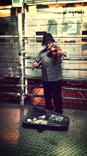 Violin station in Jakarta by Arnaldo Pellini